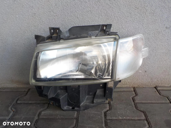 VW T4 LIFT CARAVELLE MULTIVAN LAMPA LEWA PRZÓD