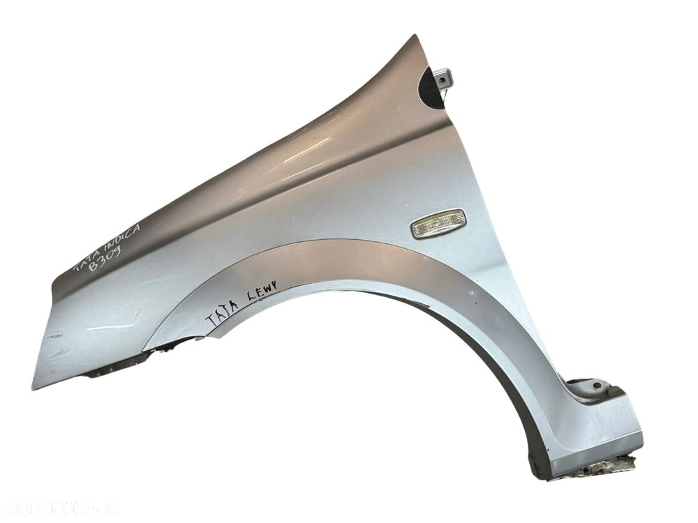 BŁOTNIK LEWY TATA INDICA SREBRNY ORYGINAŁ - 1