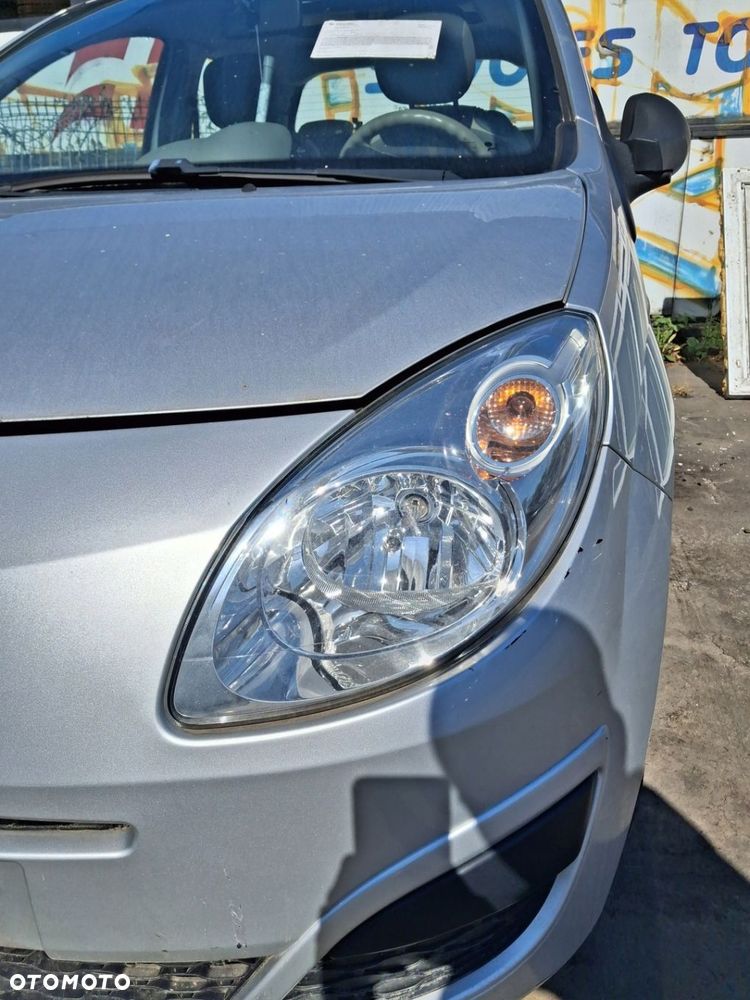 RENAULT TWINGO II 07-11 lampa lewa przód EU