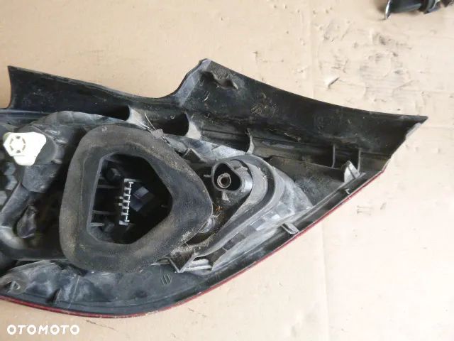 LAMPA PRAWY TYŁ PRAWA TYLNA OPEL CORSA D - 7