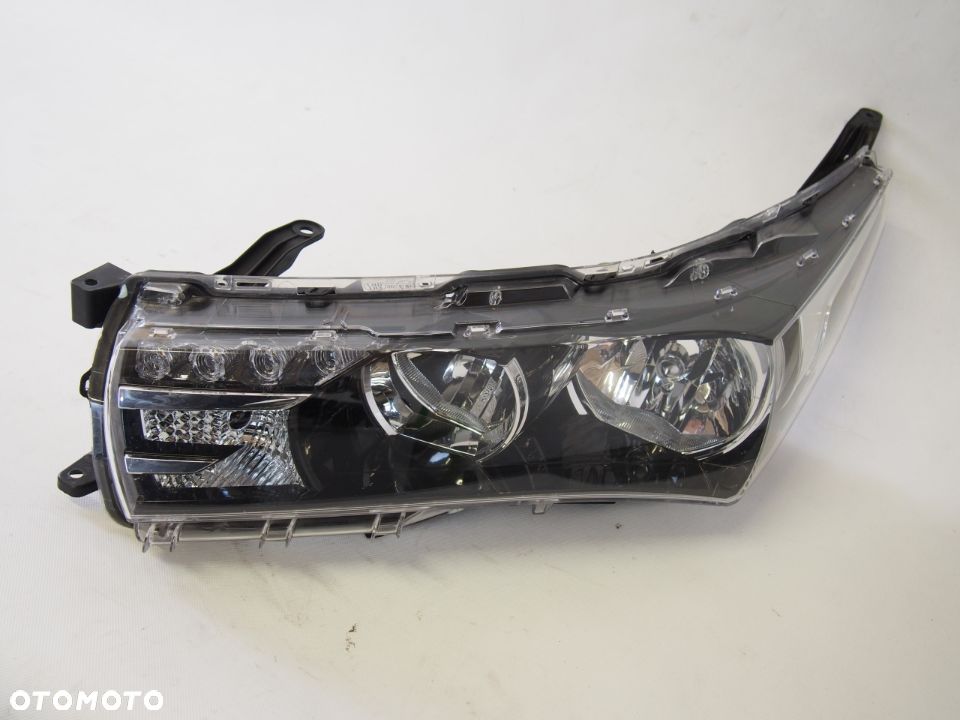 Toyota Corolla Reflektor lewy lampa lewa XI 13-15r - 1