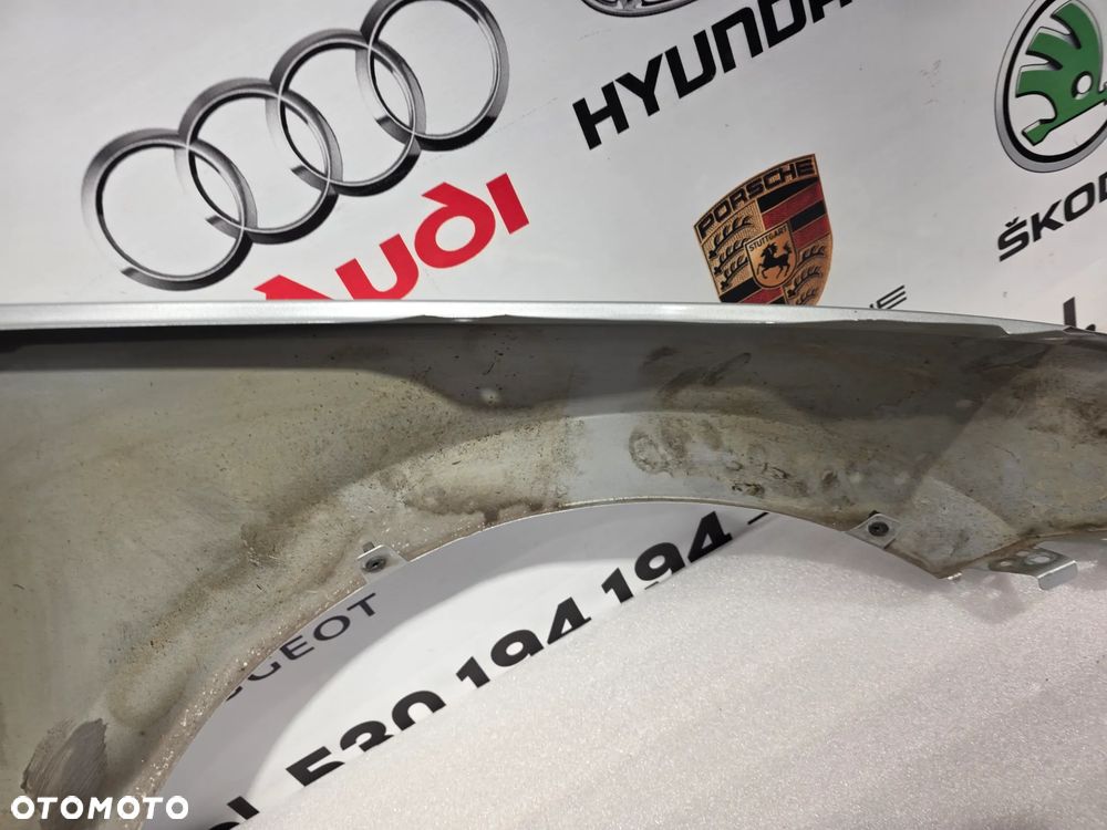 SKODA OCTAVIA 4 IV 5E3 20- LEWY BŁOTNIK PRZEDNI PRZÓD NR 5E3821105 NR AUKCJI BŁ321 - 25