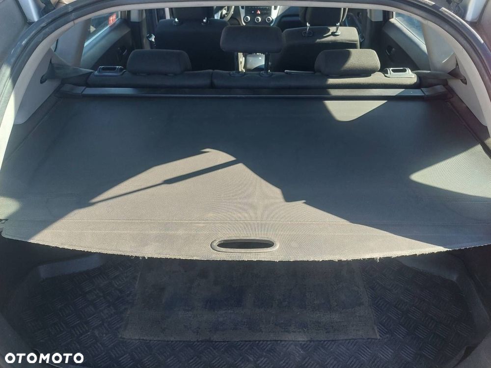 ROLETA BAGAŻNIKA KIA CEED I LIFT - 2