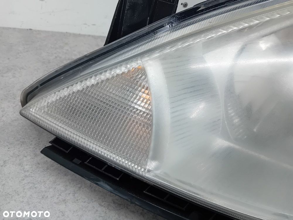 LAMPA PRZÓD LEWA NISSAN TIIDA 26060EM00A 1ED983483-03 - 2