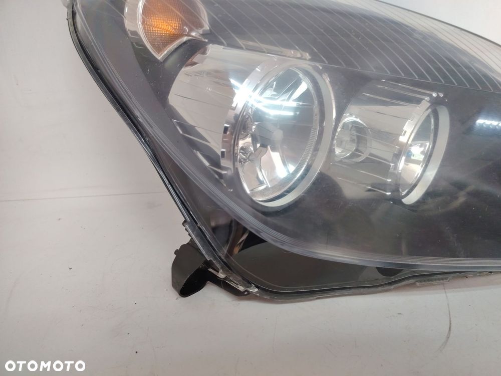 OPEL ASTRA H III 3 24451033 1EG270370 LAMPA PRZÓD PRZEDNIA PRAWA  EUROPA - 5