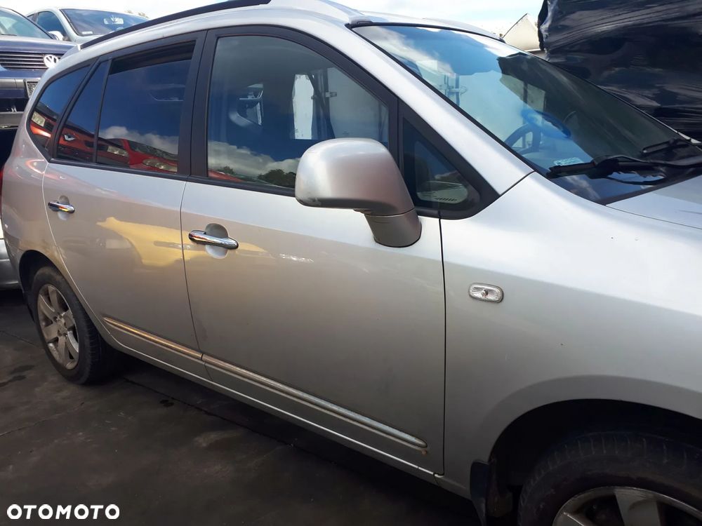 KIA CARENS III 06-11 OSŁONA PRZECIWSŁONECZNA PRAWA LEWA  7S - 9