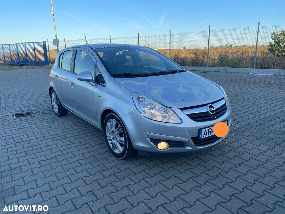 Opel Corsa 1.2i Cosmo - 1