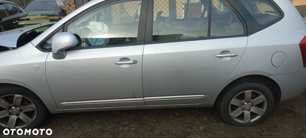 kia carens III 3 06-1 2 7Sdrzwi klapa TYLNA poznań - 1