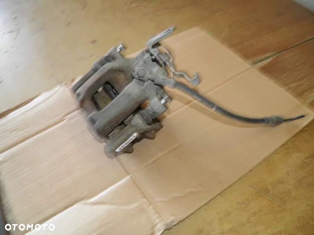 ZACISK HAMULCOWY VW AUDI SKODA BOSCH - 4