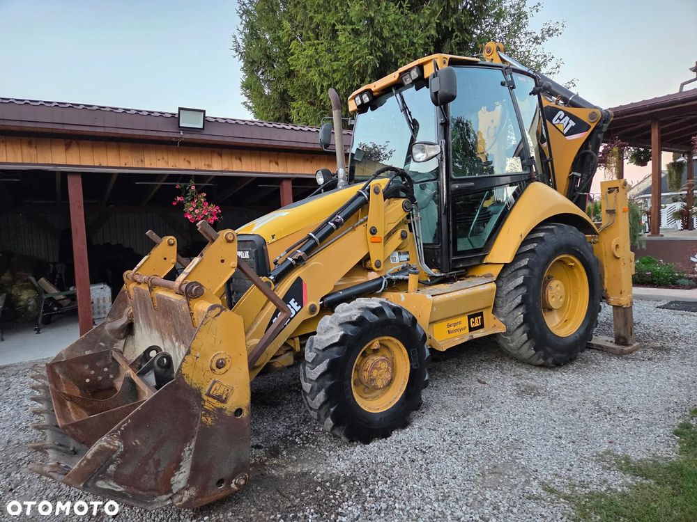 Caterpillar CAT 428E - 1
