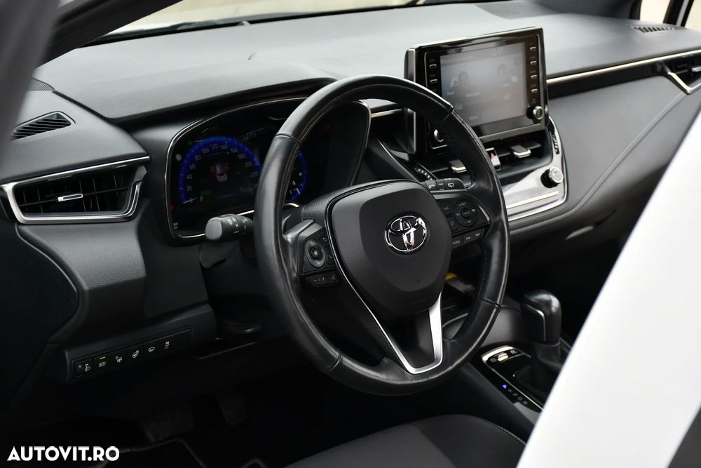 Toyota Corolla 1.8 HSD Exclusive - 31