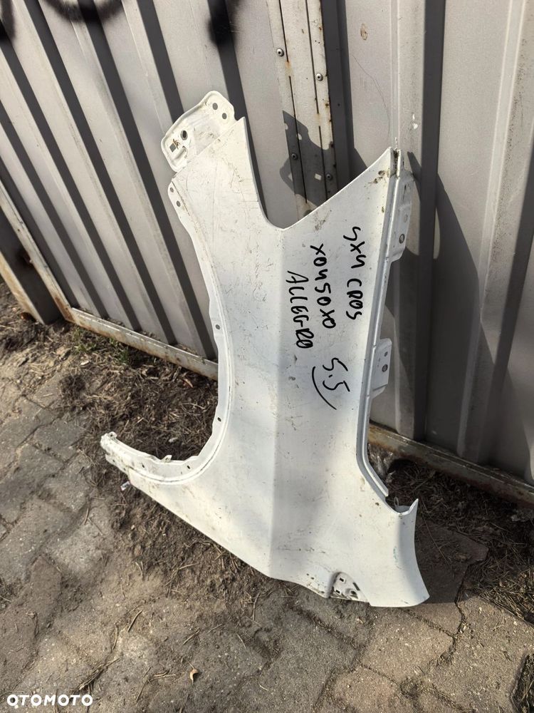 Błotnik Suzuki S-Cross 2013-2021r. Przód Lewy - 2