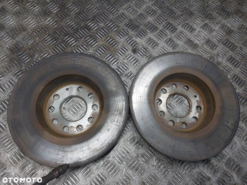 TARCZE HAMULCOWE TYŁ + KLOCKI + ZACISKI VOLKSWAGEN PASSAT B6 - 4