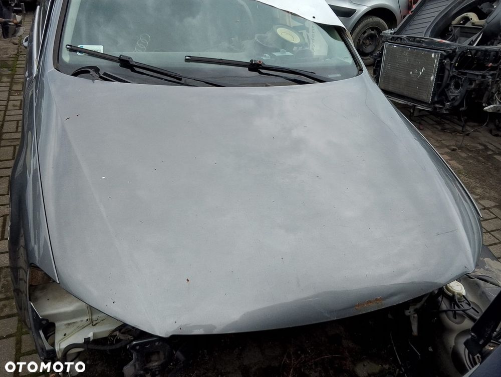 Volkswagen Passat B6 (05-10r.) 1.9TDI 105KM. Silnik BKC Skrzynia GQQ lakier LA7T. Cały na części. GWARANCJA !!!  Przód Tył Zestaw Komplet Drzwi Klapa Zderzak Błotnik Maska Grill Atrapa Szyba Pas Lampa Lusterko Boczki Fotel Kanapa Kokpit Deska Rozdzielcza Przełącznik Włącznik Sterownik Przewody Wiązka Instalacja Moduł Komputer Czujnik Listwa Pompa Alternator Wtryski Głowica Rozrusznik Kompresor Sprzęgło Dwumas Silnik Skrzynia ABS Klimatyzacji Paliwa Wspomagania Kolektor Turbina Przepustnica Zawór Chłodnica Koło Hak Belka Sanki Zawieszenie Mcpherson Półoś Amortyzator Wydech Tłumik Zacisk Most - 2