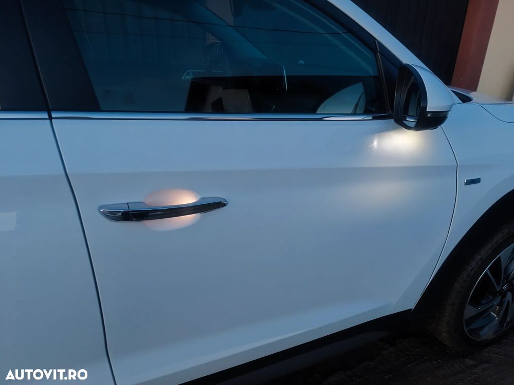 Hyundai Tucson 2.0 CRDI 4WD 8AT Premium - 12