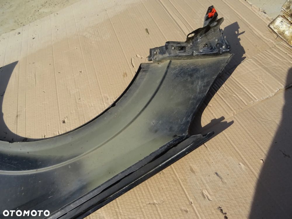 Błotnik Prawy Przód Opel Astra H - 11