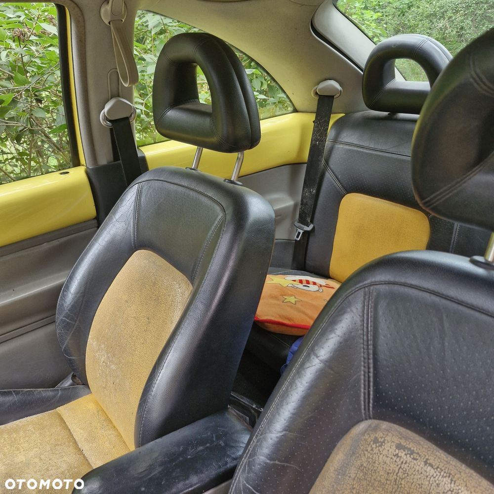 Volkswagen New Beetle - 7