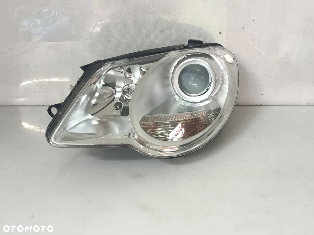 VW EOS 05-10r LAMPA PRZEDNIA LEWA ORYGINAŁ EUROPA
