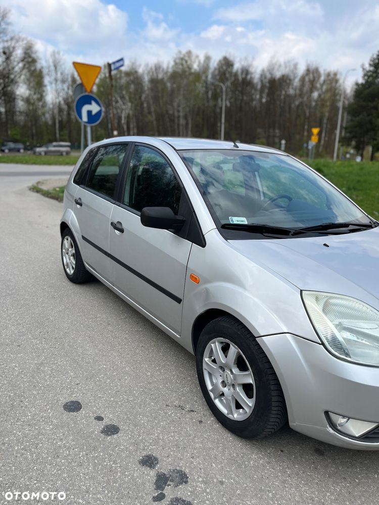 Ford Fiesta 1.4 Ghia - 10