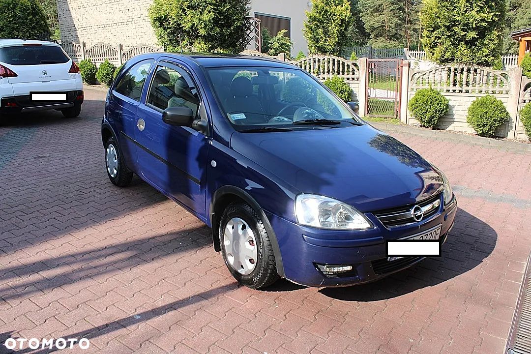 Opel Corsa 1.2 16V Cosmo - 1