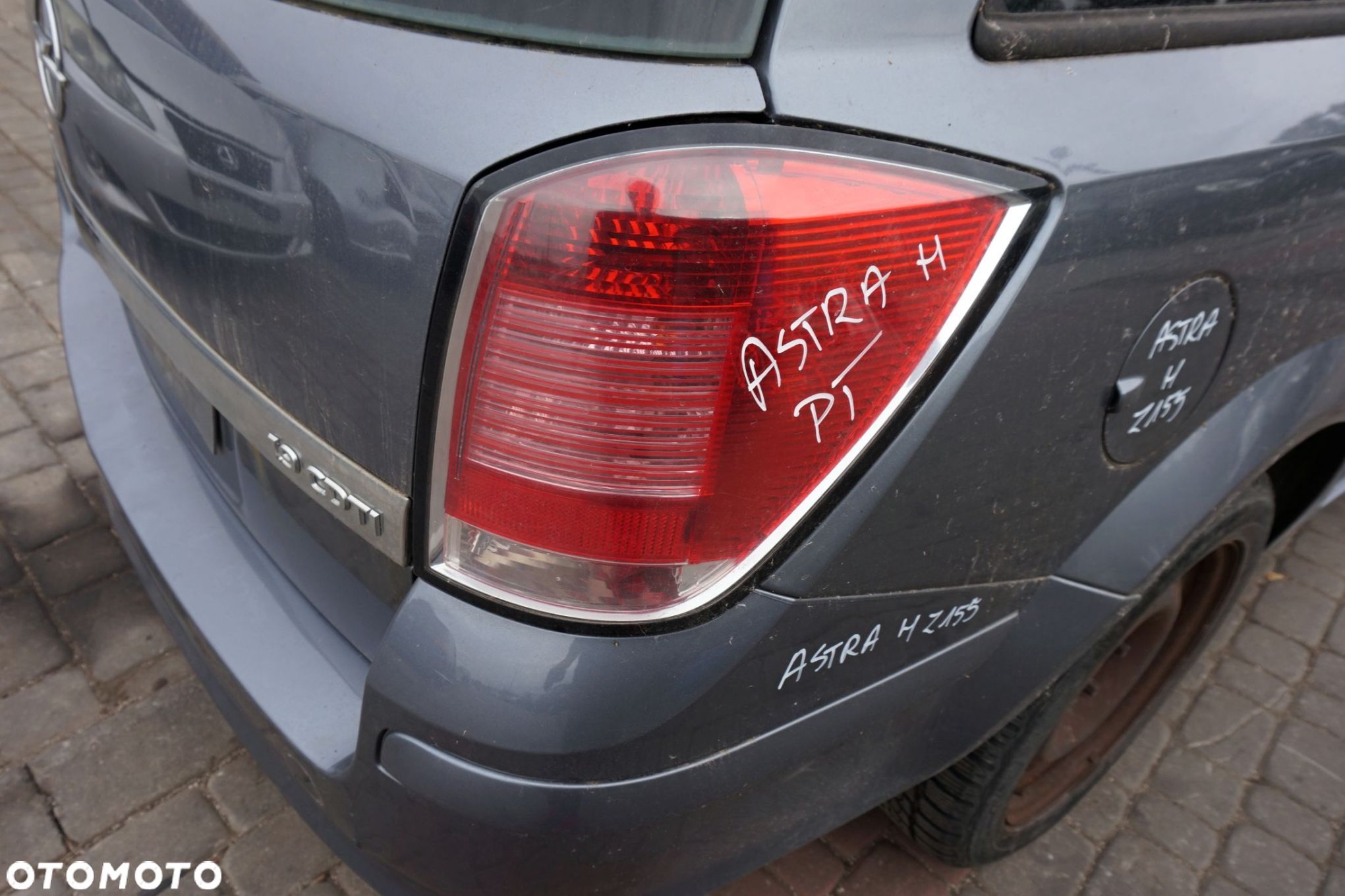 LAMPA TYLNA PRAWA ASTRA III H KOMBI  OPEL 2004-2006 - 1