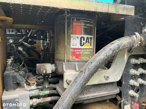 Caterpillar M313D - 11