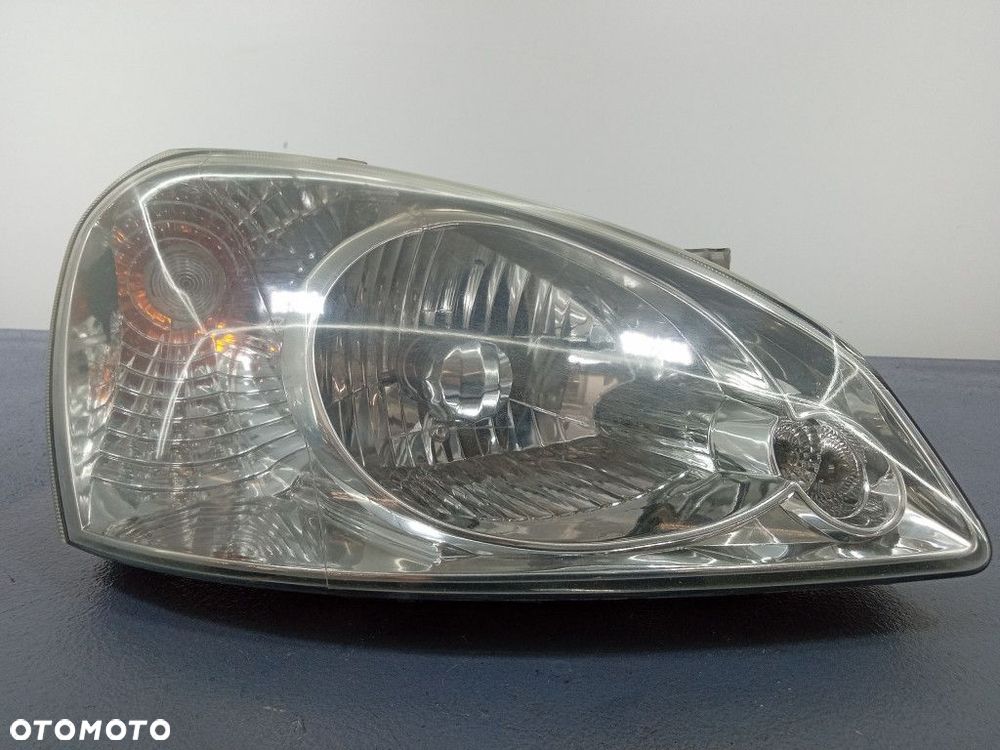 TATA INDICA V2 07- REFLEKTOR PRAWY LAMPA EU - 1