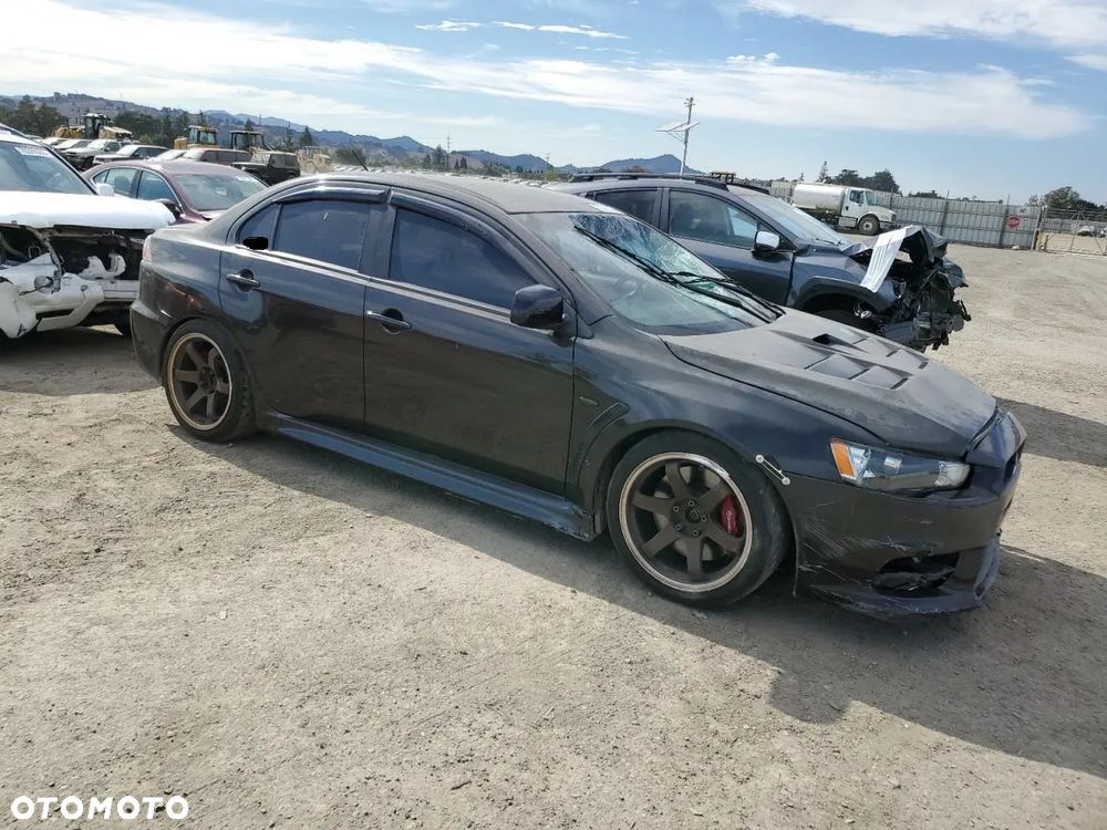 Mitsubishi Lancer Evolution GSR - 4