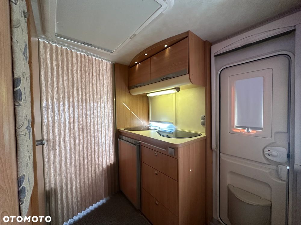 Adria ADORA 472 LU z napędem i markizą ze ścianami.  DMC 1300 - 26