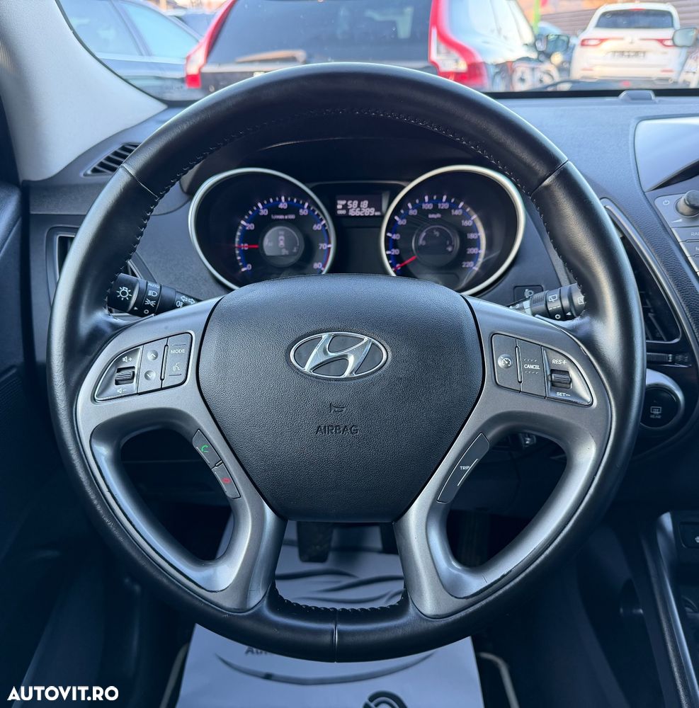 Hyundai ix35 blue 1.6 2WD Finale Gold - 12