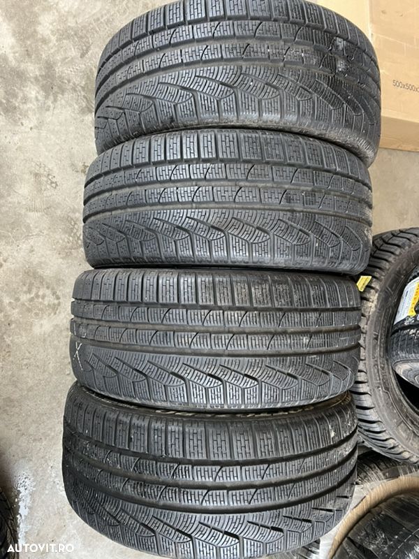 vând 4 anvelope 235/35/20 pirelli de iarnă ca noi - 1
