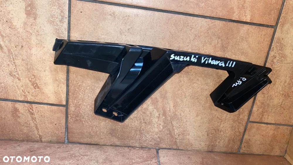 ŚLIZG POD LAMPĘ PRAWY PRZÓD SUZUKI VITARA III 71733-54P0 - 2