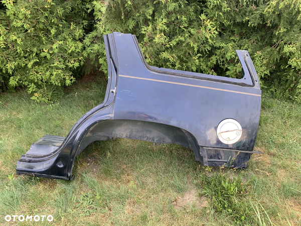 CADILLAC ESCALADE III 6,2 V8 2006-2014 BŁOTNIK TYLNY LEWY ĆWIARTKA LEWA TYŁ