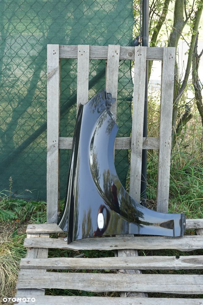 Błotnik przód przedni prawy Kia Rio II Czarny