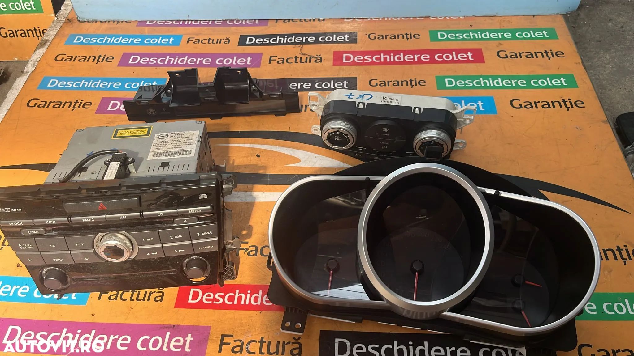 Ceasuri radio display comanda clima Mazda cx7 2011 - 1