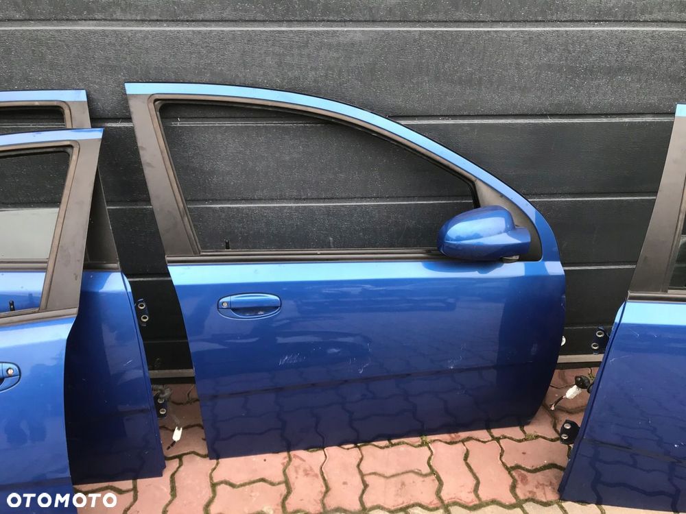 Daewoo Kalos Chevrolet Aveo 33u DRZWI TYLNE KLAPA LAMPA TYL - 2