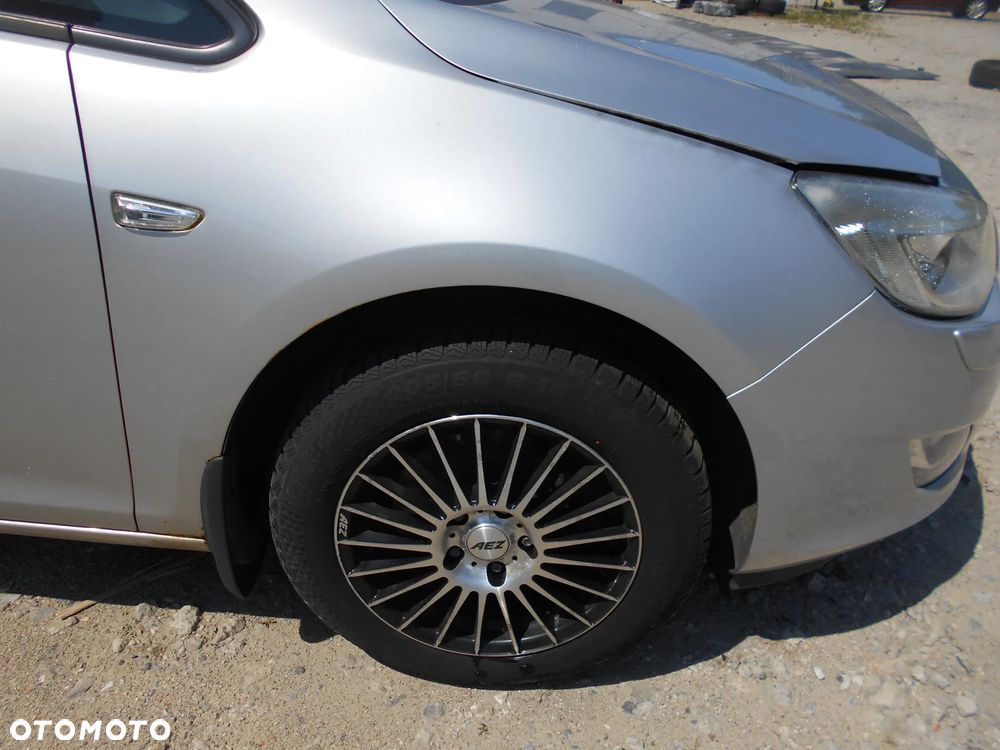 OPEL ASTRA J SPORT TOURER KOMBI KOD LAKIERU Z176 92KW-125KM  SILNIK SKRZYNIA BIEGOW MANUALNA 6 BIEGOWA MASKA LAMPA LUSTERKO PAS PRZEDNI BLOTNIK ZAWIESZENIE  ZDERZAK PRZOD SPRYSK SPRISKIWACZ LAMP SOCZEWKA CZESCI - 9