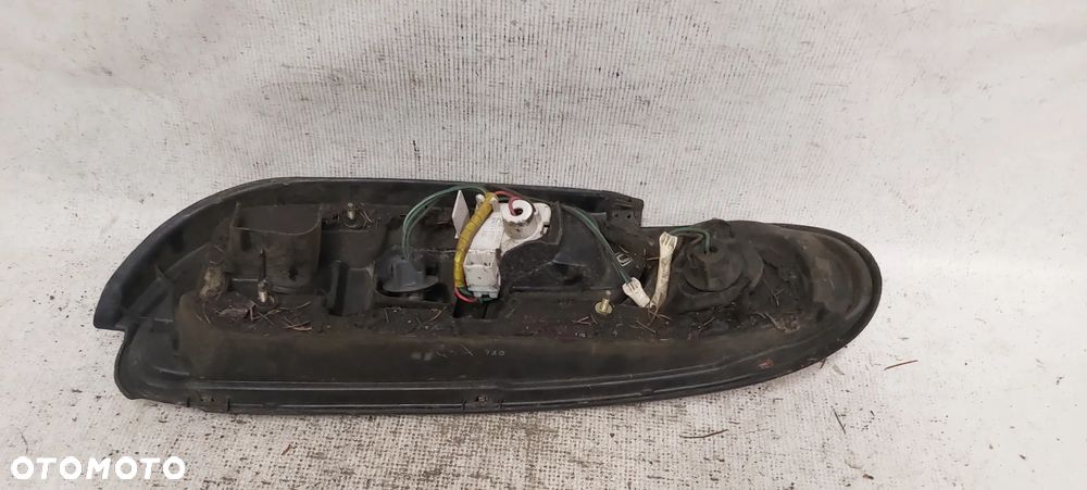 .  PRZOD PRZEDNIA LAMPA LEWA NISSAN 100 NX - 4