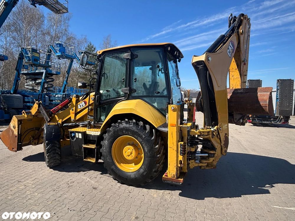 Caterpillar 428 - 9