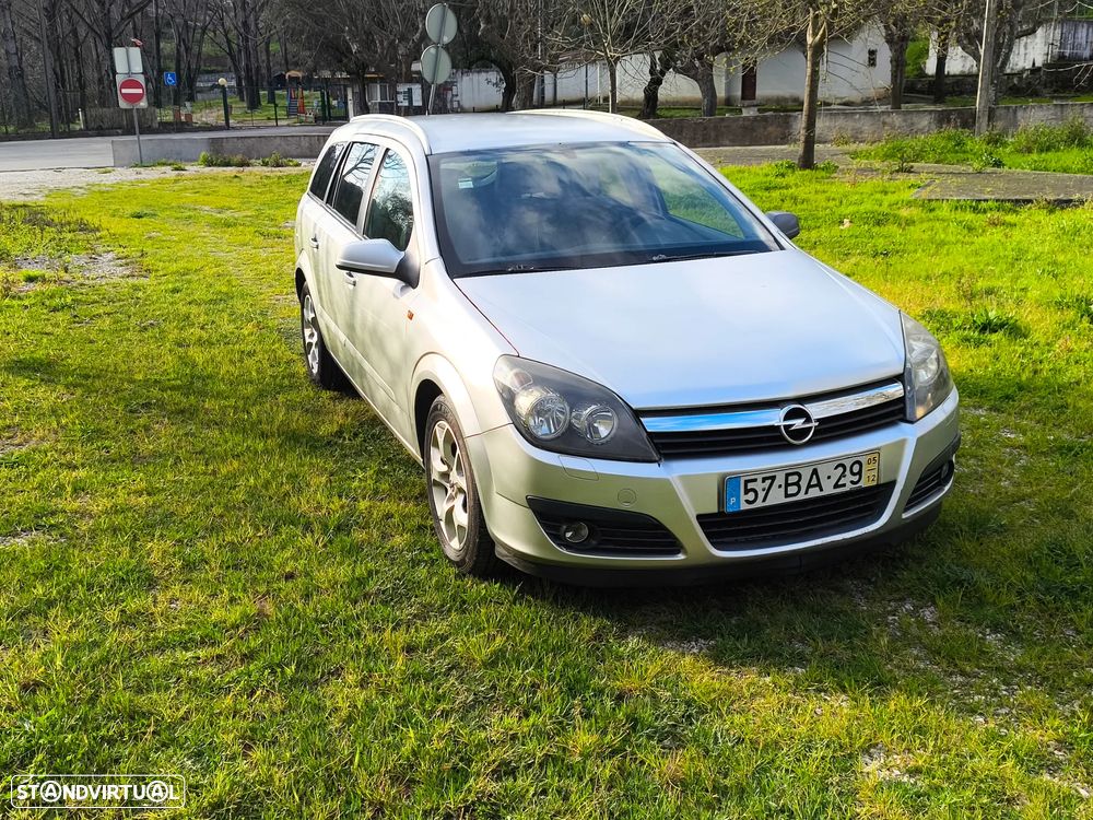 Opel Astra Caravan 1.9 CDTi Cosmo - 1