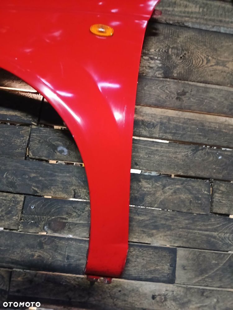 Chevrolet Aveo Błotnik lewy - 4