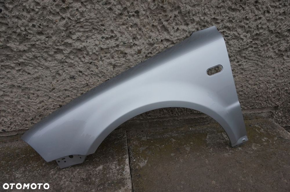 BŁOTNIK PRZÓD LEWY VW PASSAT B5 LIFT 00/03r LA7W - 1