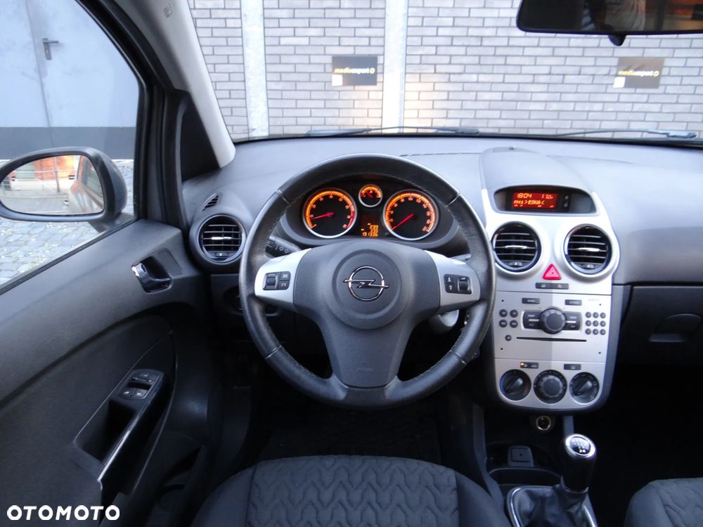 Opel Corsa 1.2 16V Enjoy - 21