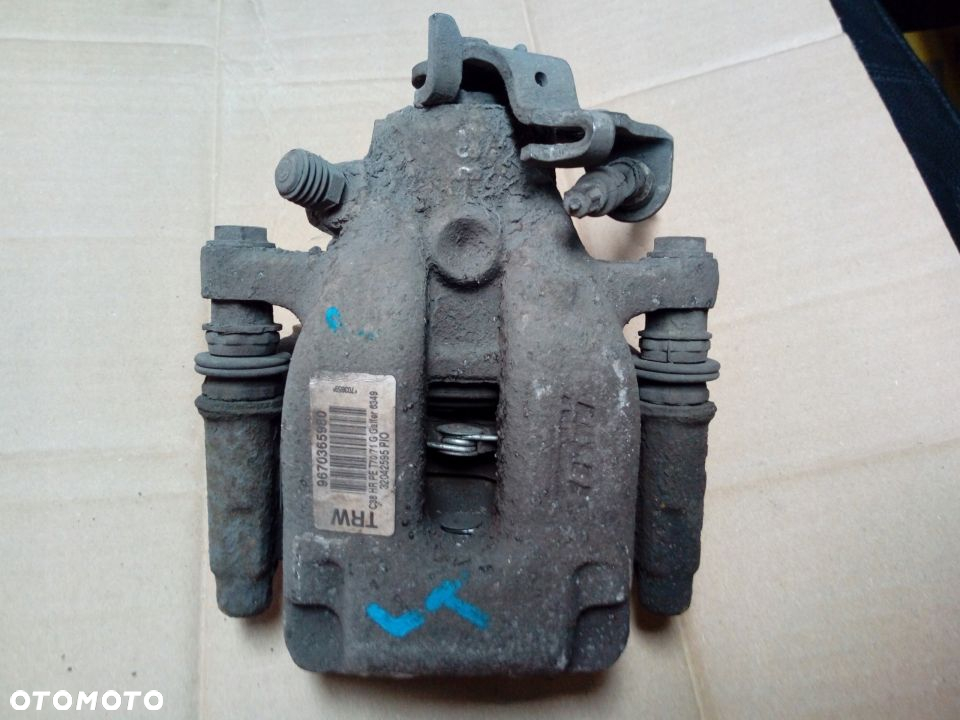 Citroen C4 I Peugeot 308 T7 zacisk hamulcowy tyl tylny  prawy lewy - 4