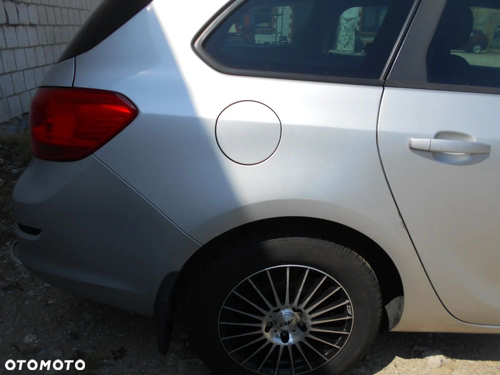 OPEL ASTRA J SPORT TOURER KOMBI KOD LAKIERU Z176 92KW-125KM  SILNIK SKRZYNIA BIEGOW MANUALNA 6 BIEGOWA MASKA LAMPA LUSTERKO PAS PRZEDNI BLOTNIK ZAWIESZENIE  ZDERZAK PRZOD SPRYSK SPRISKIWACZ LAMP SOCZEWKA CZESCI - 12