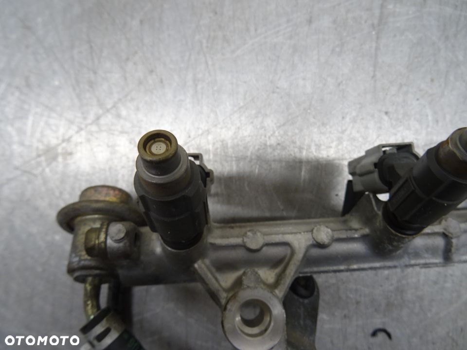 MITSUBISHI COLT V 3D 1.3B LISTWA WTRYSKOWA - 3