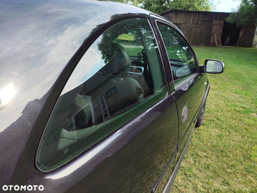 Opel Corsa 1.2 16V Cosmo - 6