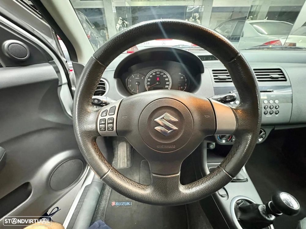 Suzuki Swift 1.3 DDiS Sport — fotografia 19
