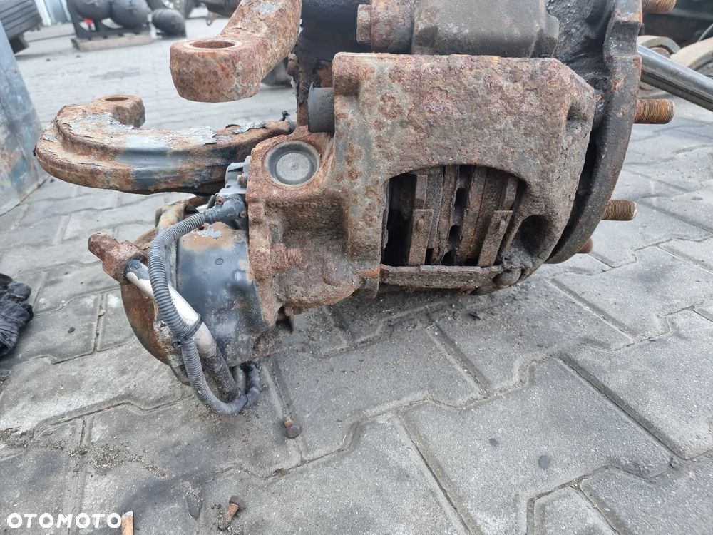 MAN TGA TGS  ZACISK HAMULCOWY LEWY - 1