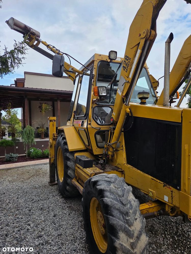 Caterpillar CAT 428B - 12